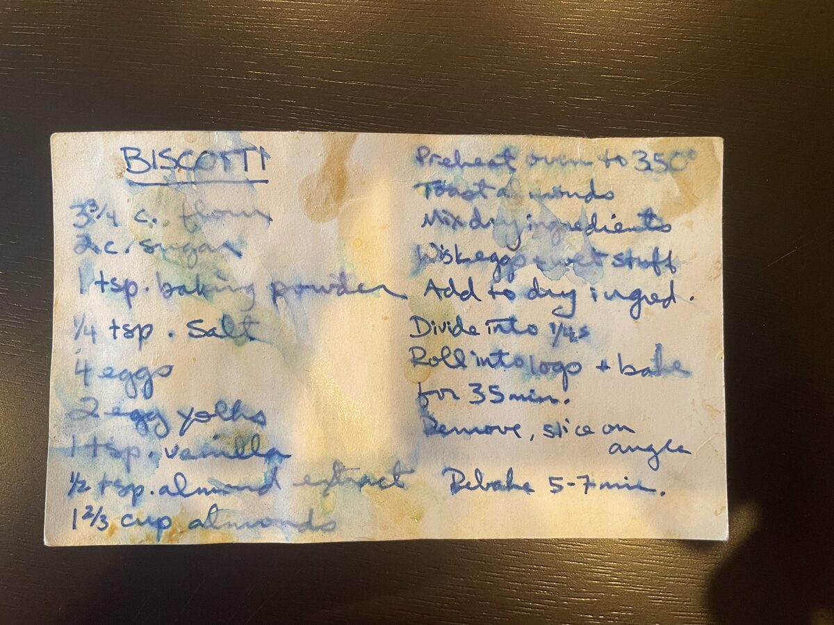 A handwritten biscotti recipe on a stained, half-legible index card